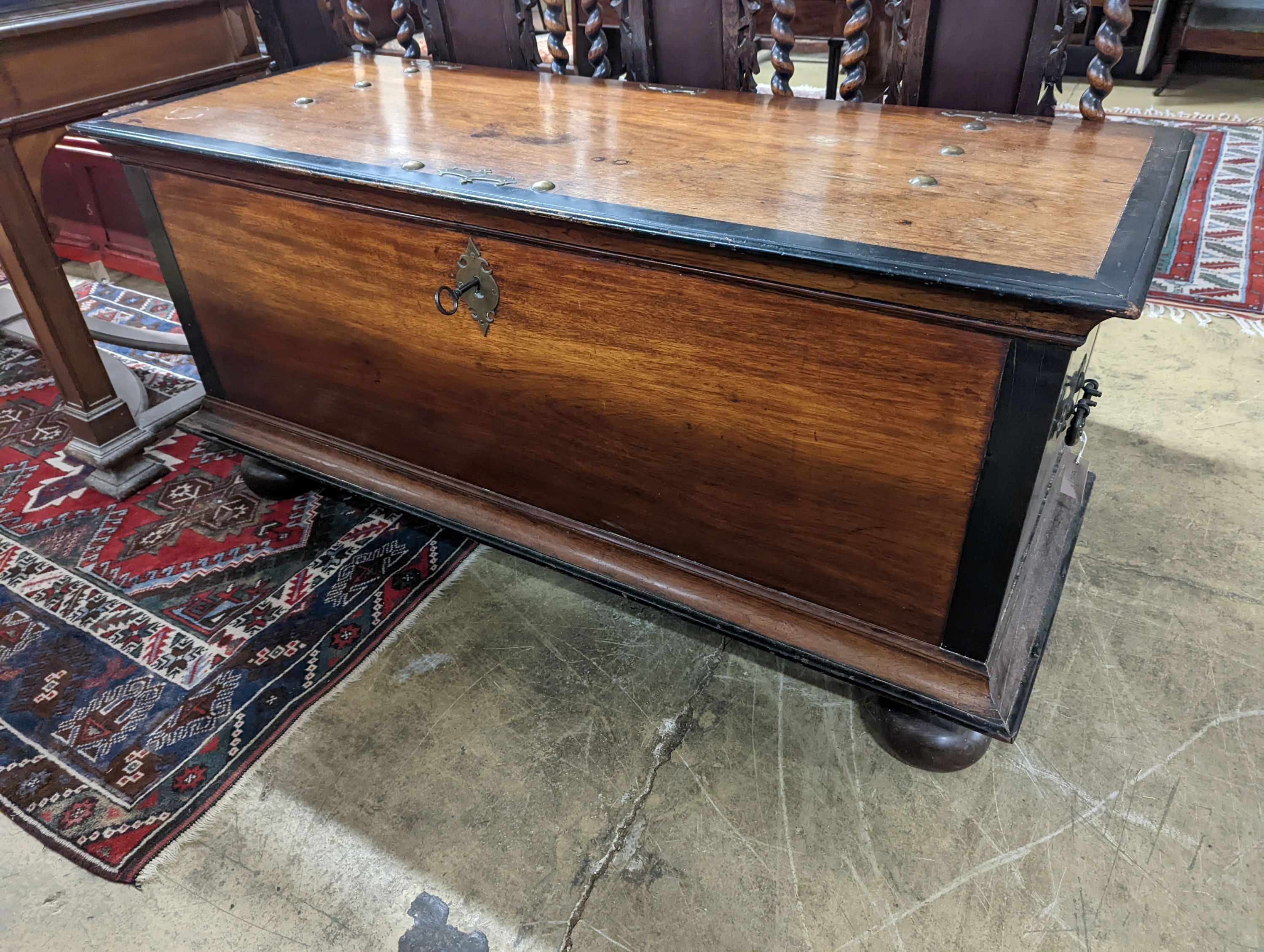 A 19th century Dutch mahogany and parcel ebonised coffer. W-154cm, D-62cm, H-76cm.
